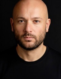 Толга Текин