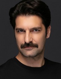 Танер Румели