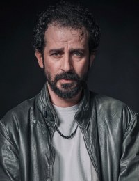 Озай Озгюлер